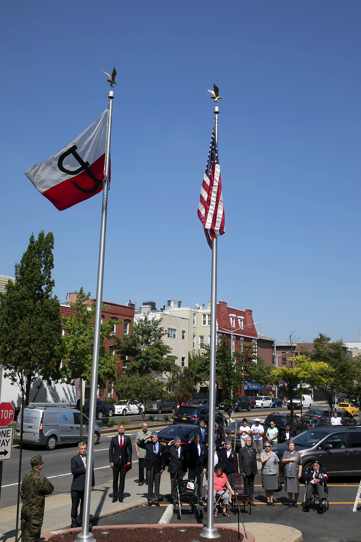 flag was raised by Tadeusz Antoniak, member of the Polish Army Veterans Association of America (PAVA)